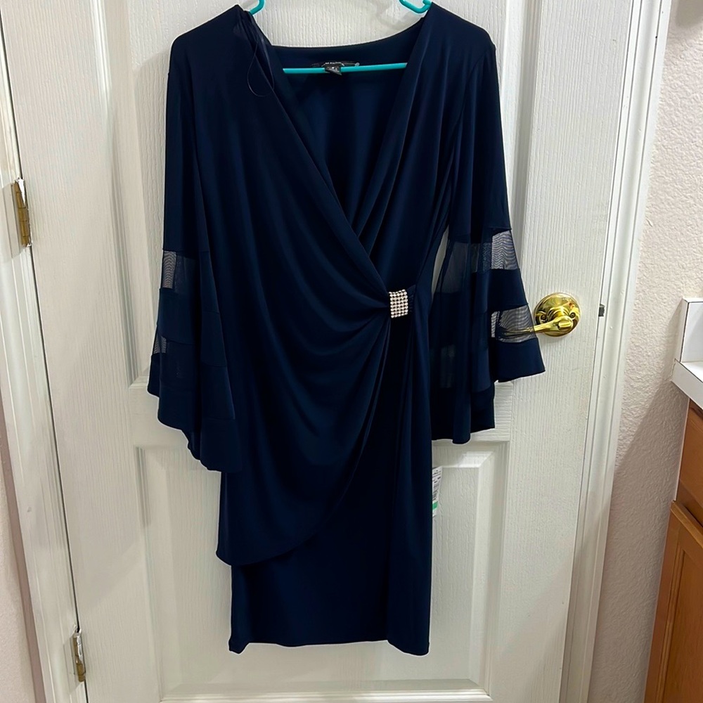 It’s a party dress which is made by the company R&M Richards